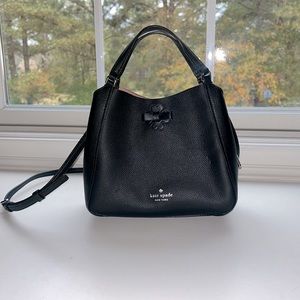 Black Kate Spade bag.